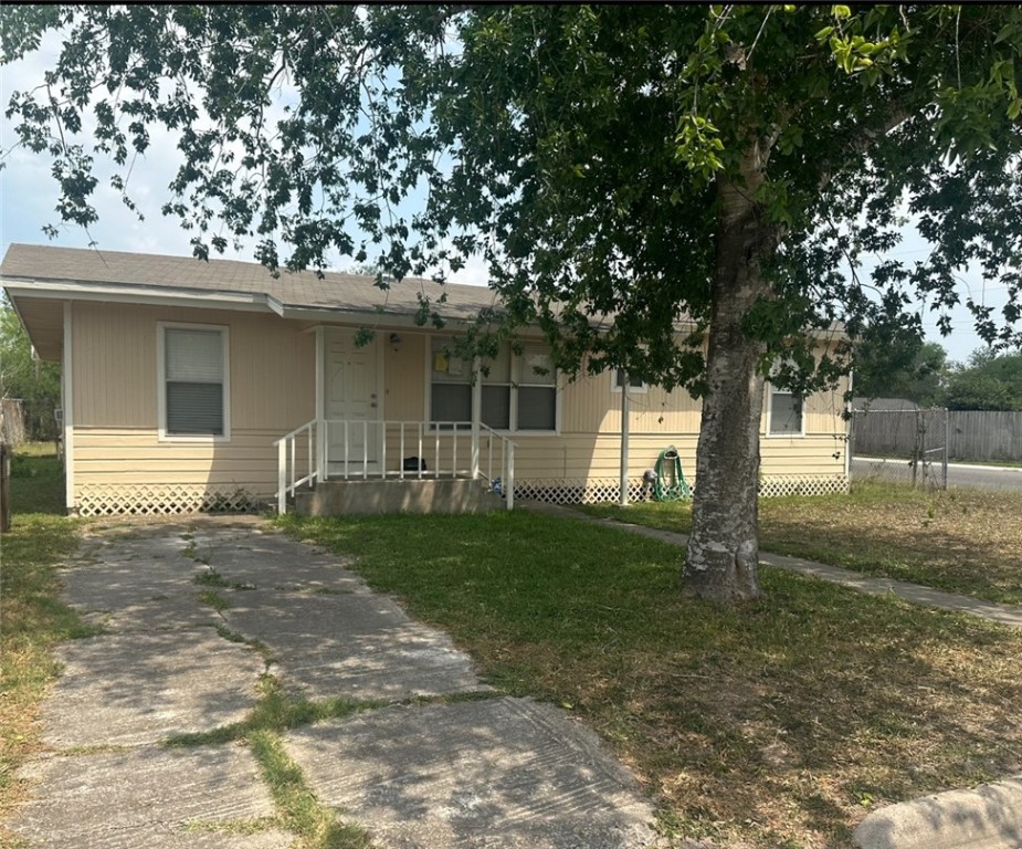 a house with trees in the background