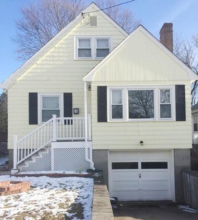 a front view of house with yard