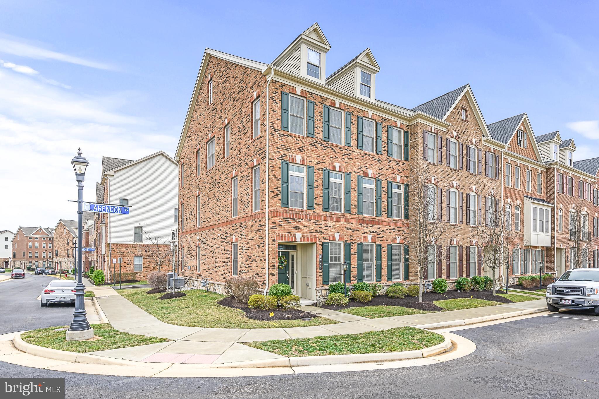 a view of a building with a yard