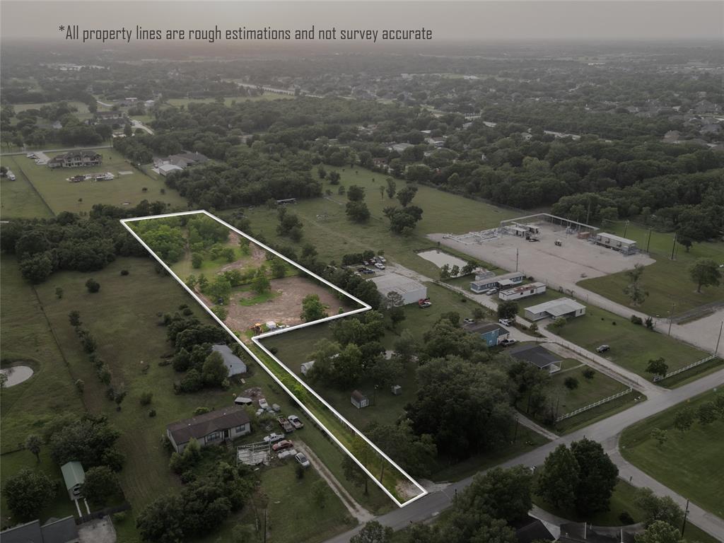 an aerial view of residential house with outdoor space