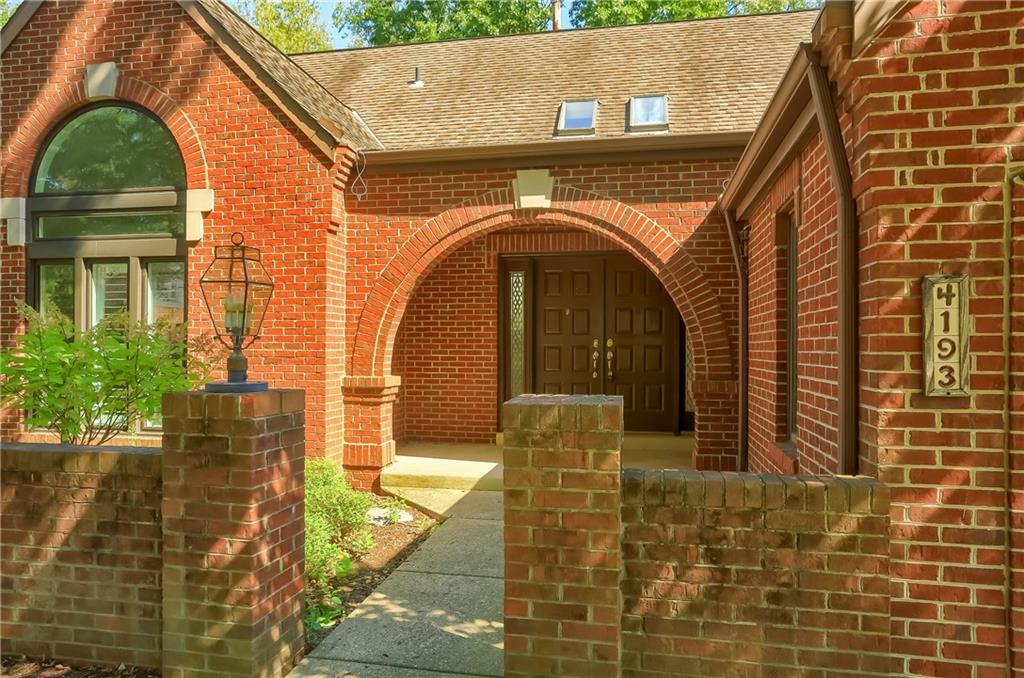 a view of entrance gate of a house