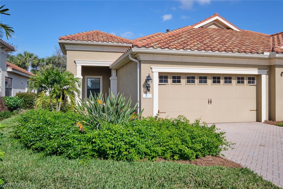 front view of a house with a small yard