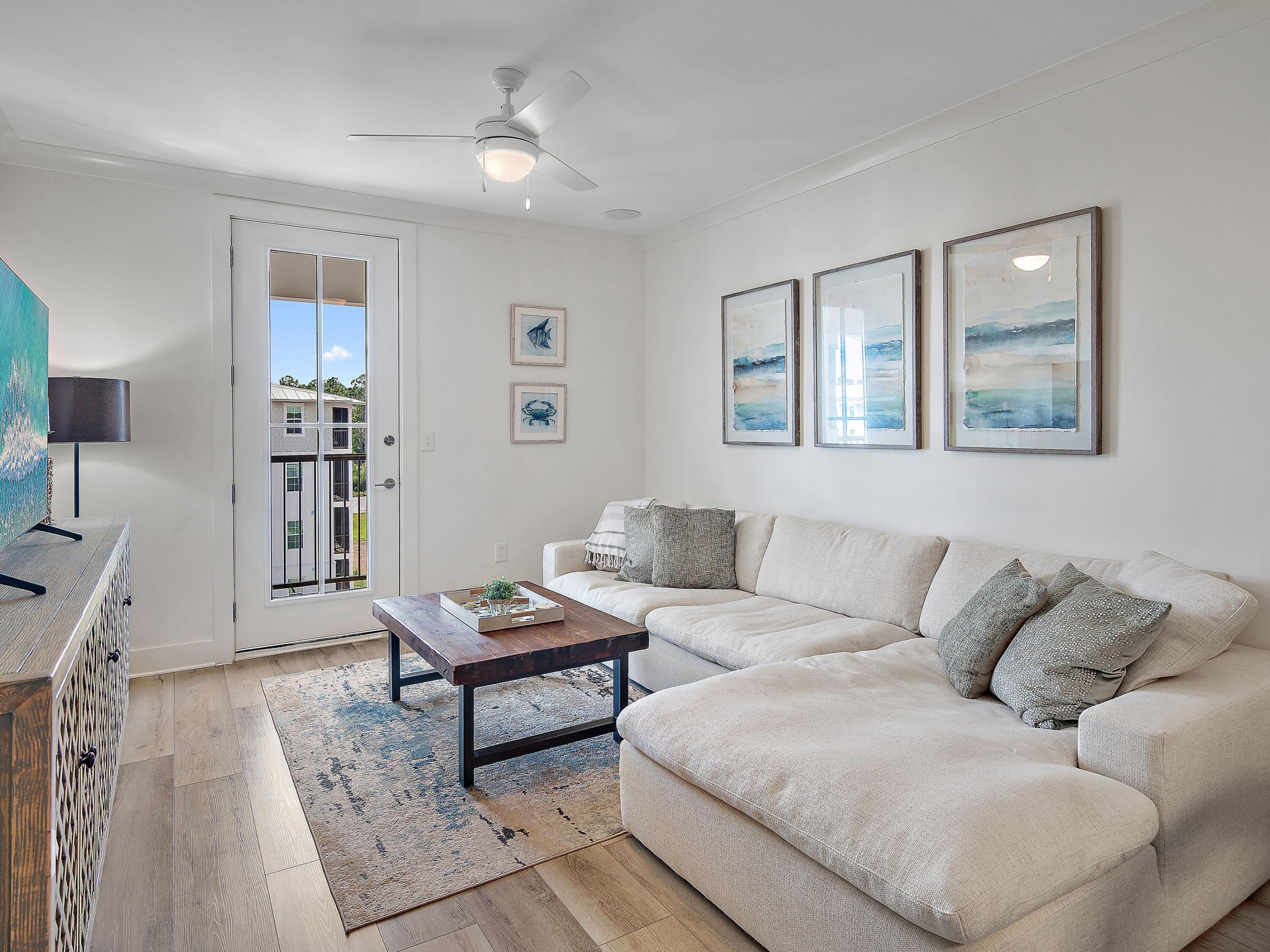 a living room with furniture and a table