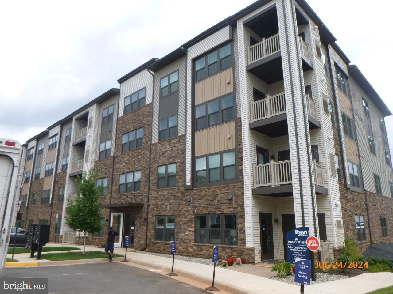 a front view of a building with street