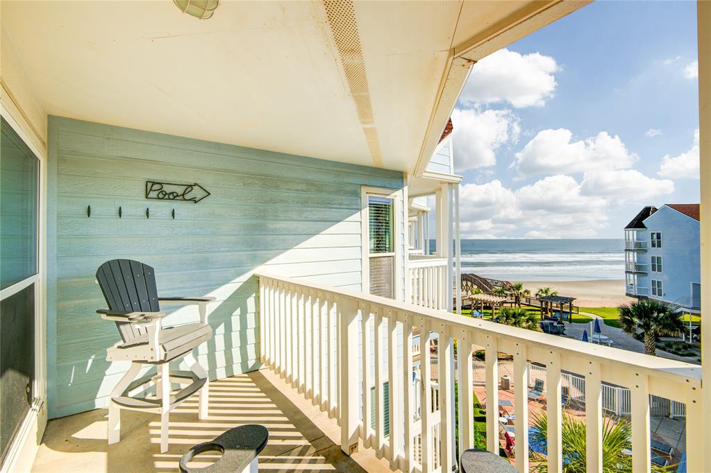 a view of balcony with furniture