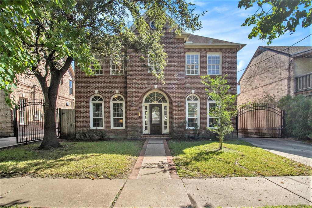 Front exterior of this stately brick home. home. Home faces North.