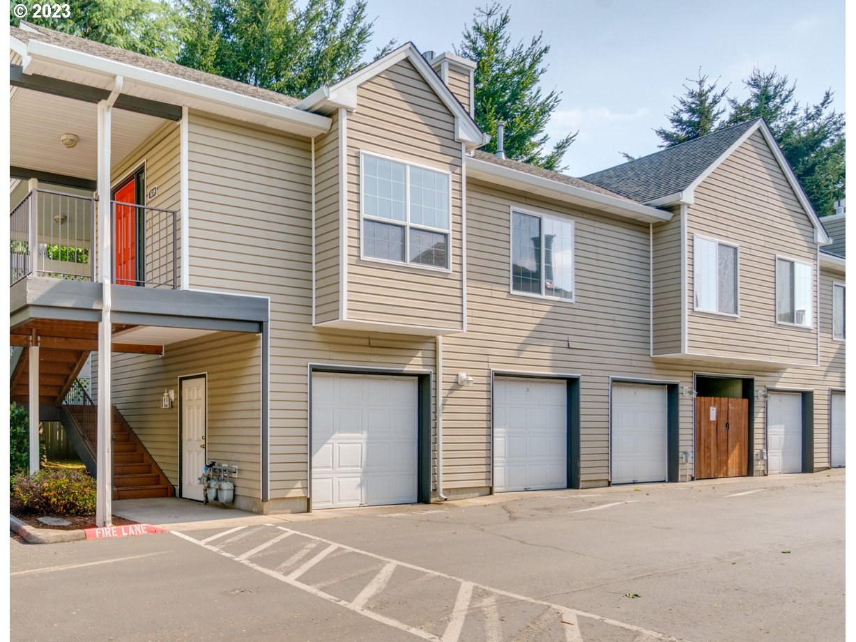 a front view of a house with a garage