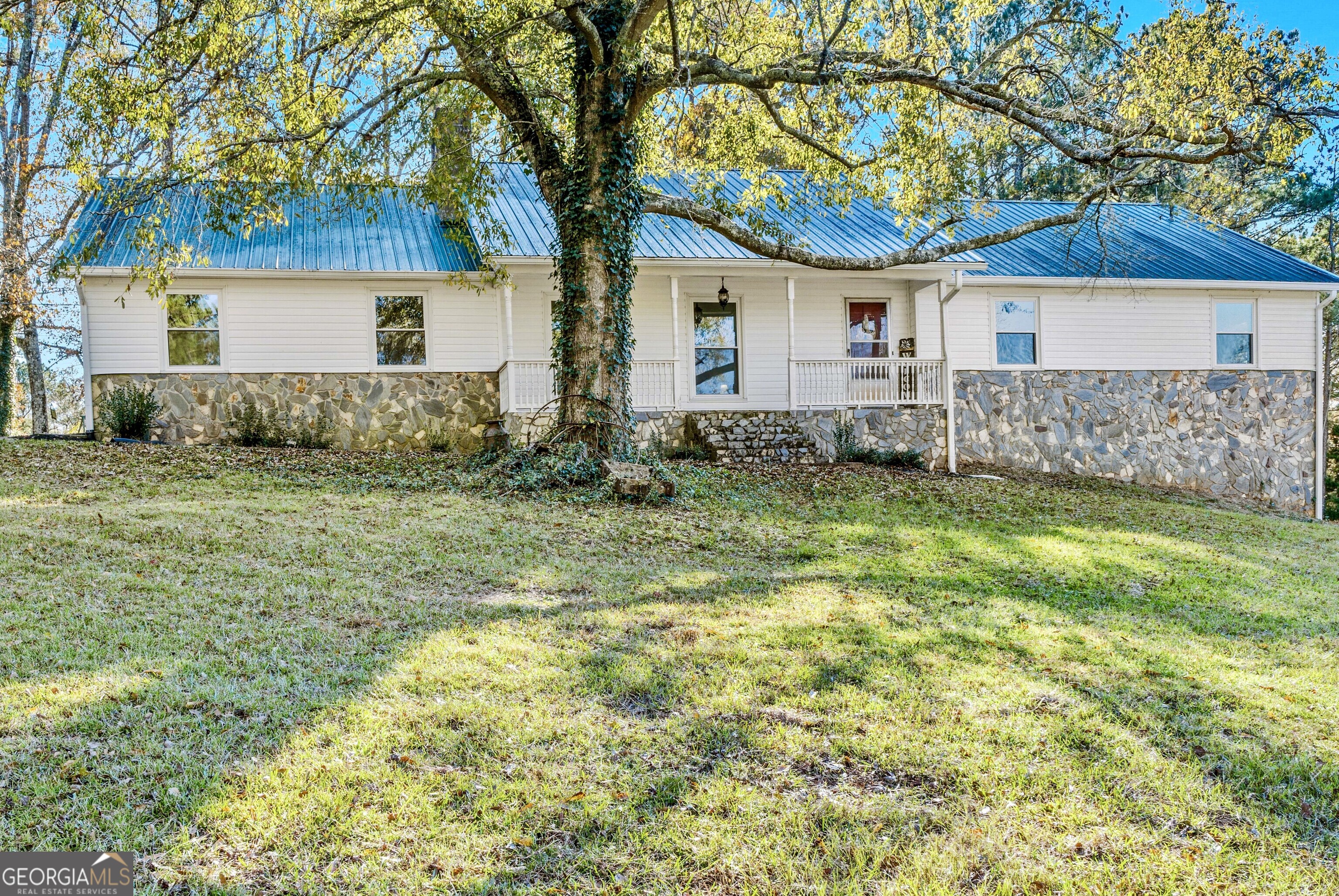 front view of a house and a yard