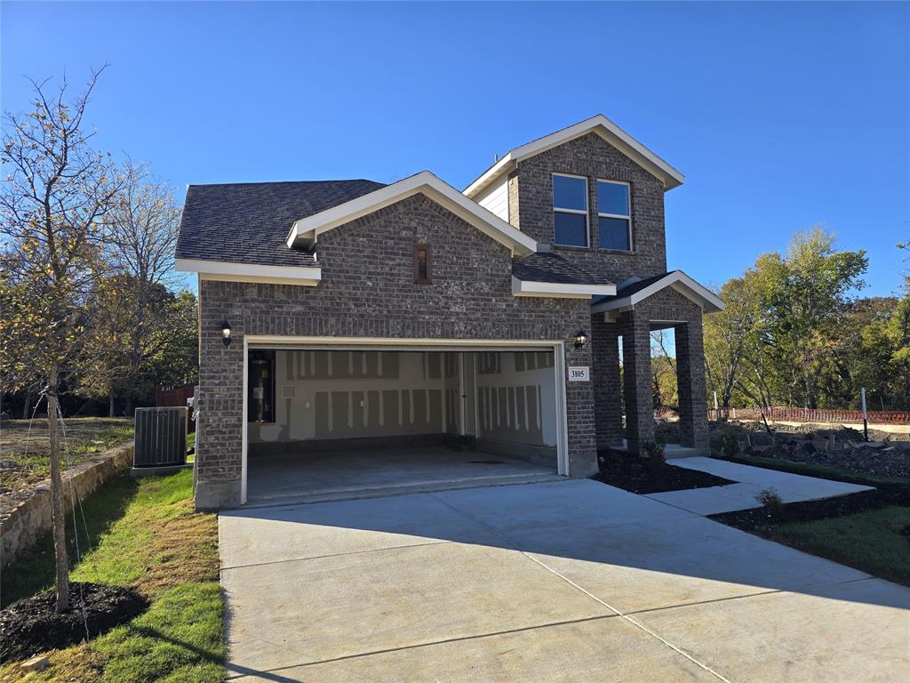 a front view of a house with yard