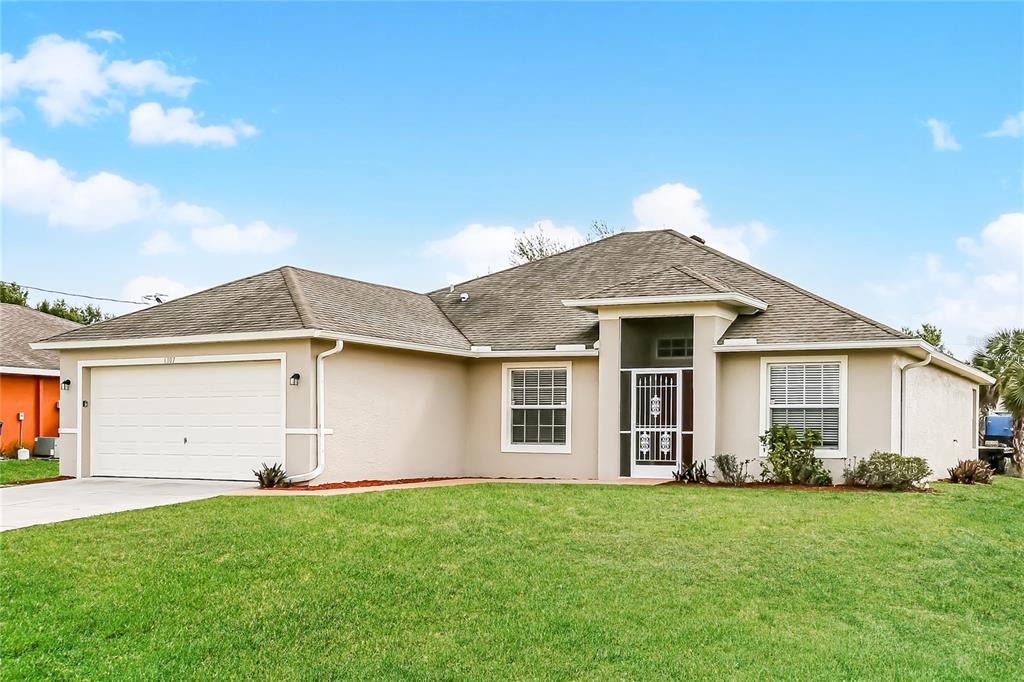 front view of house with a yard