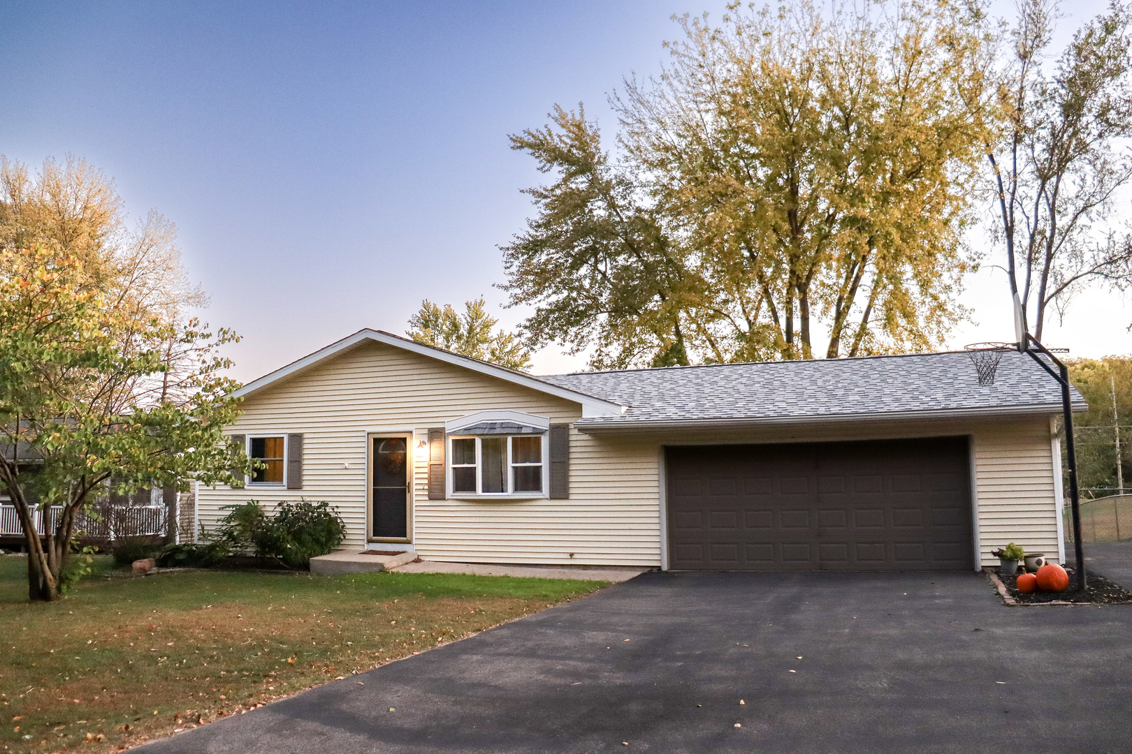 a front view of a house with a garage