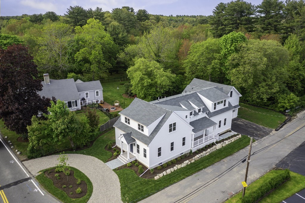 an aerial view of a house with a garden