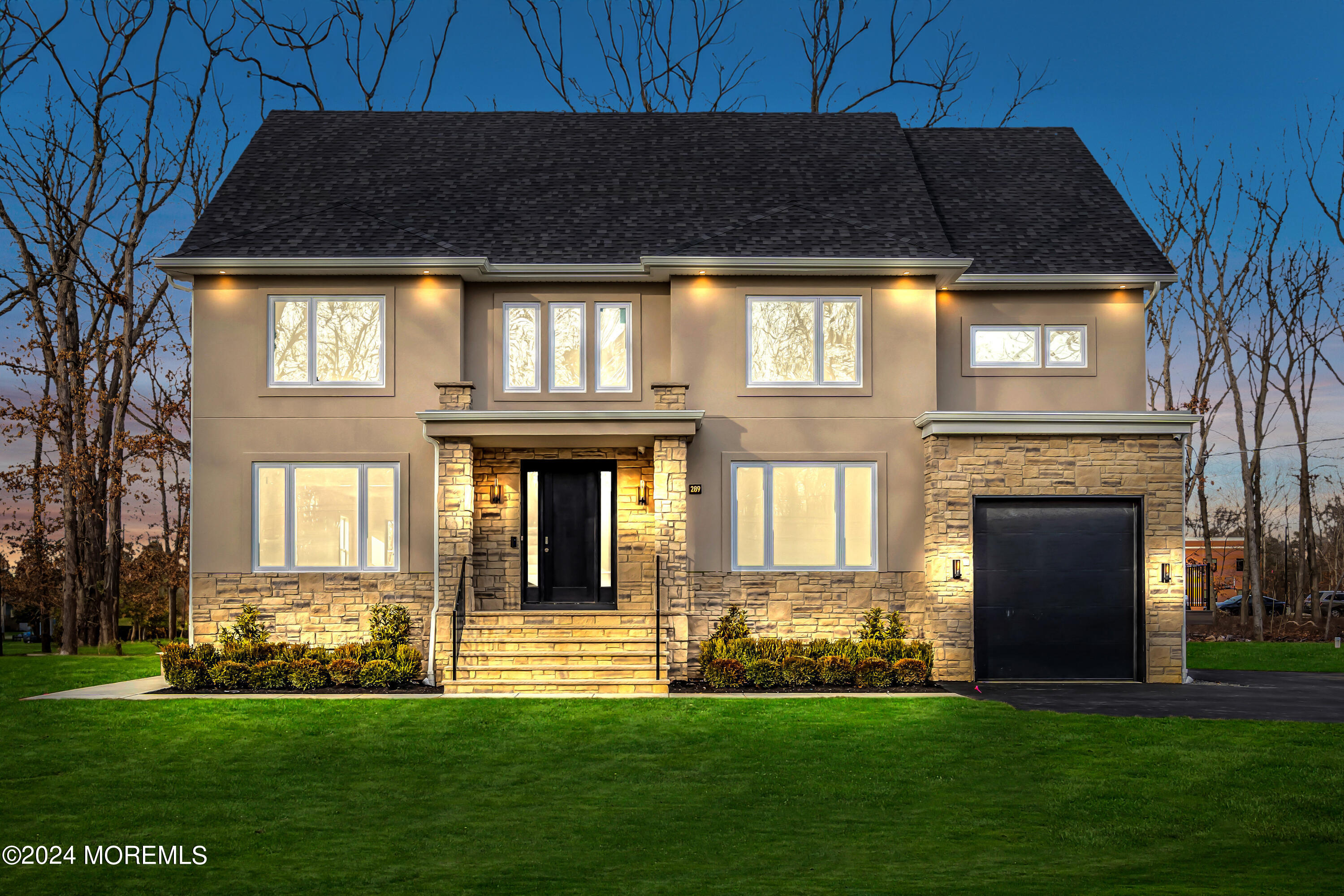 a front view of a house having yard