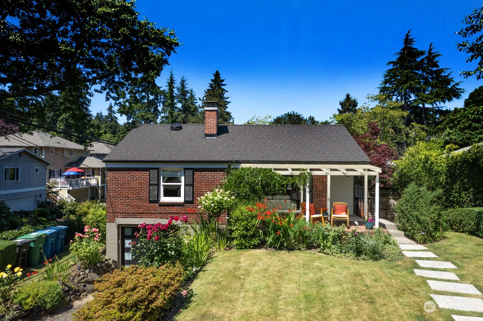 front view of a house with a yard