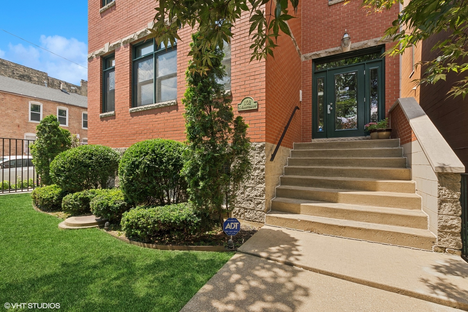 a view of a house with a garden