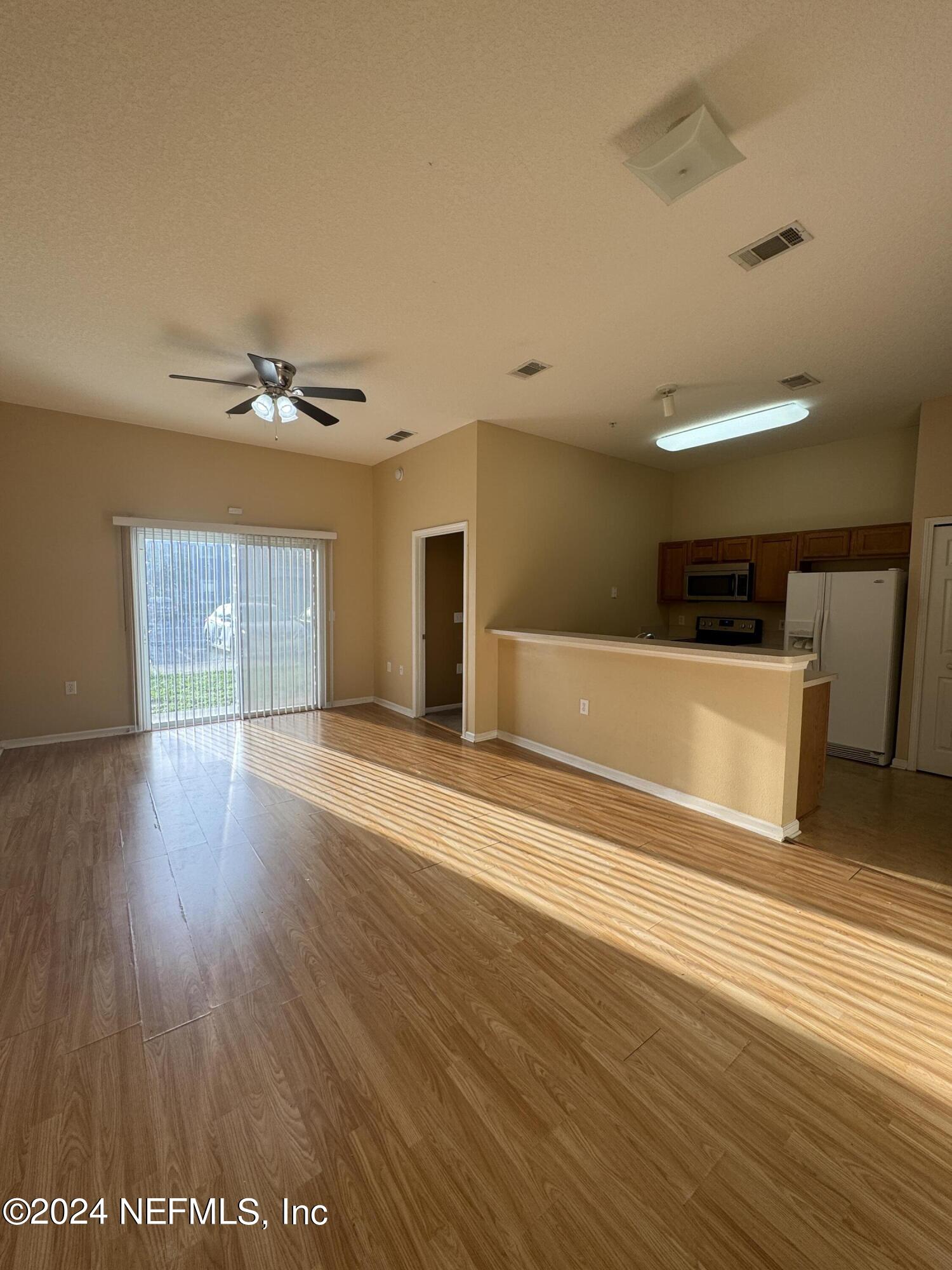 a view of a livingroom with a furniture