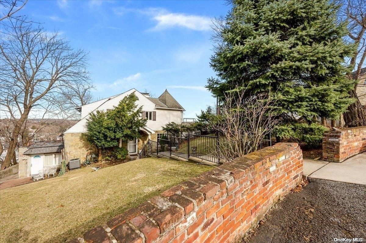 a view of backyard of a house