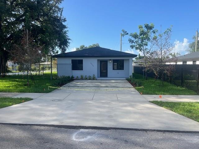 a front view of a house with yard