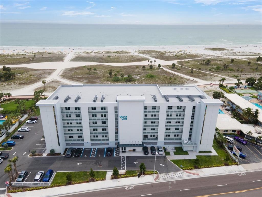 a view of a building with a ocean view