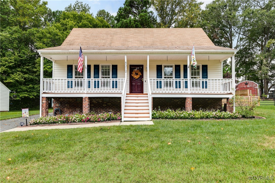 a front view of a house with porch