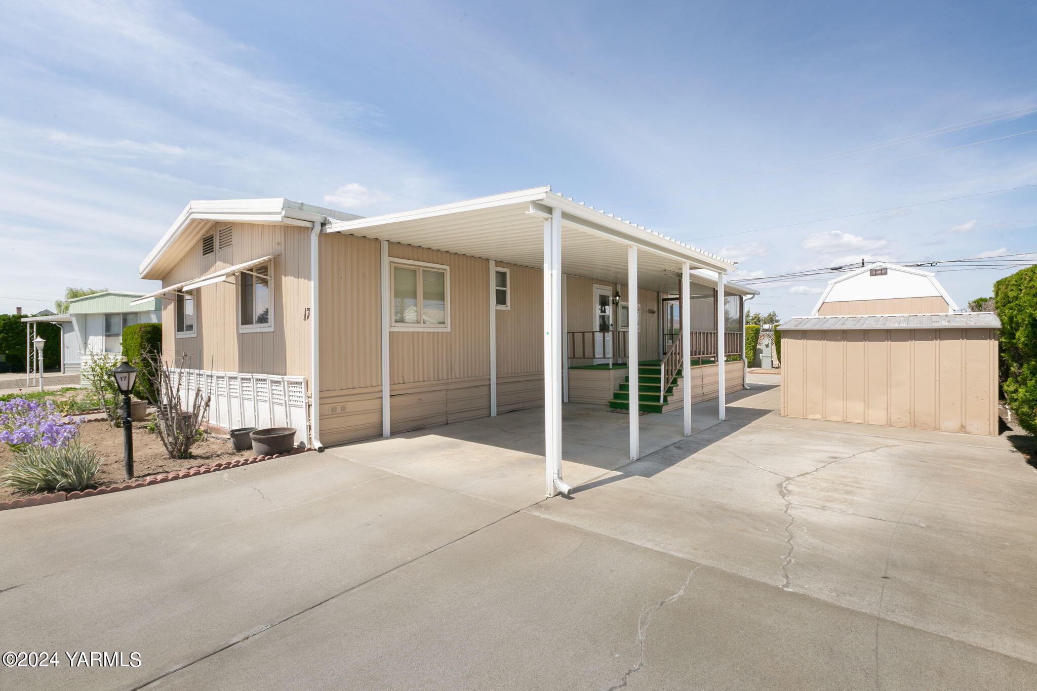 a view of a house with a garage