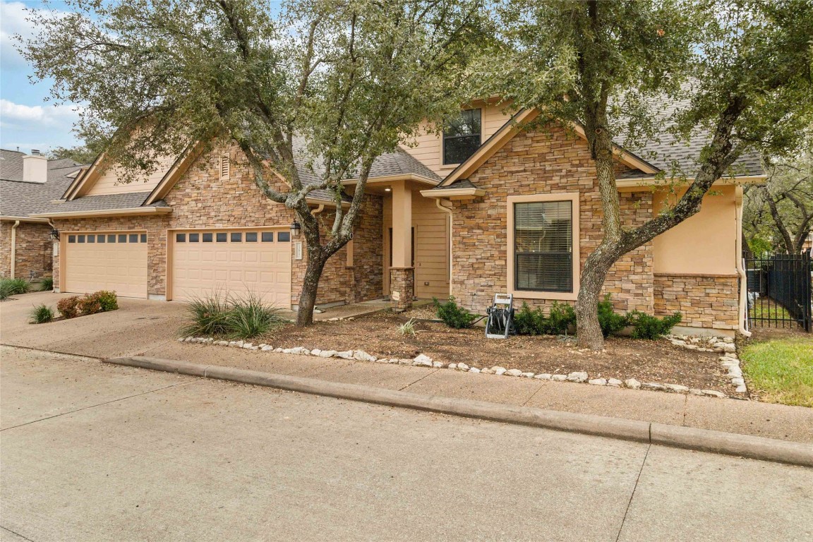 front view of a house with a street