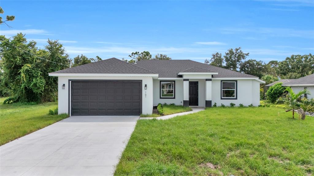 front view of a house with a yard