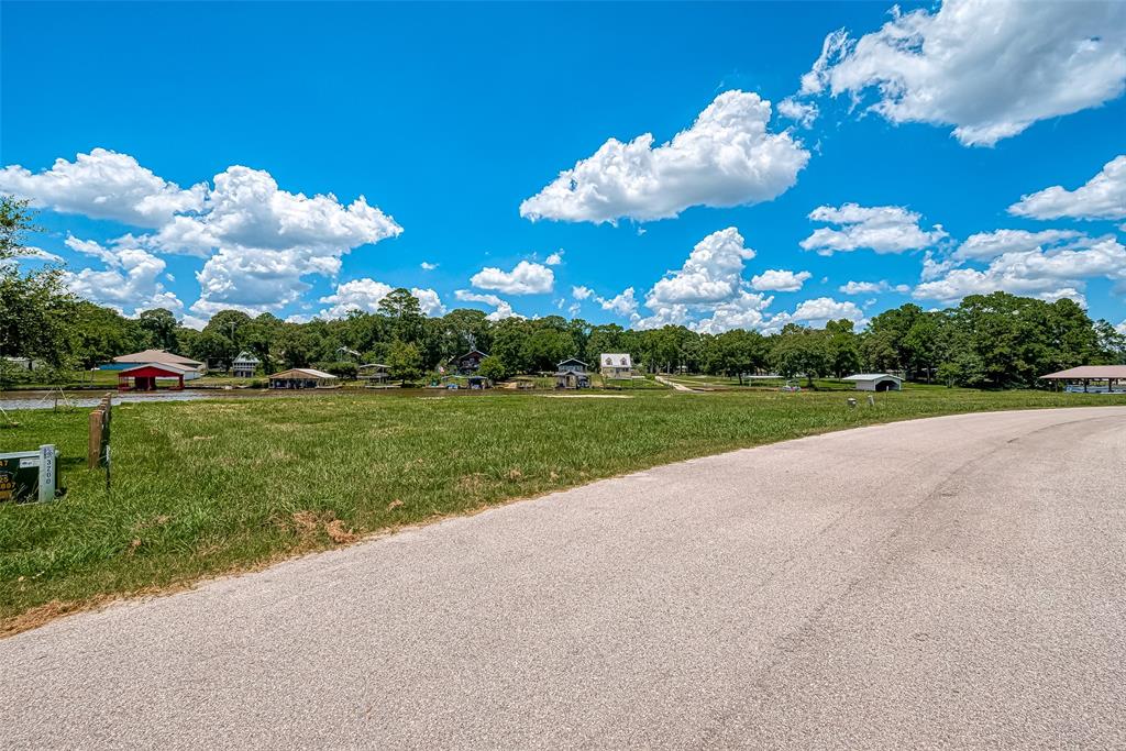 a view of a golf course with a lake