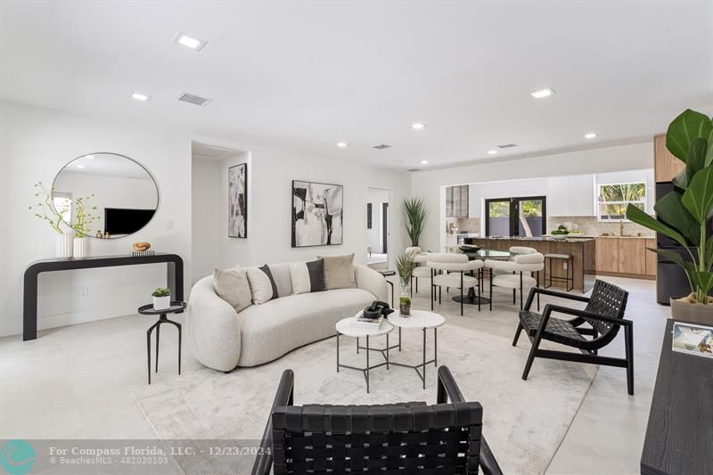 a living room with furniture and a view of living room