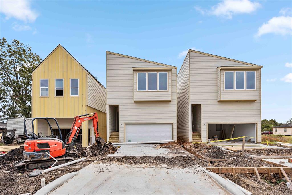 a front view of a house with an outdoor space