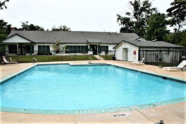 a view of a house with a swimming pool