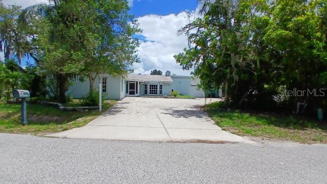 front view of house with a yard