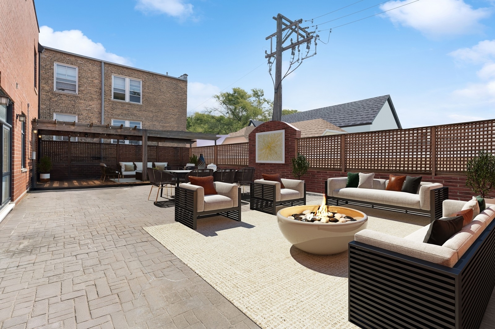 a view of a patio with couches and potted plants