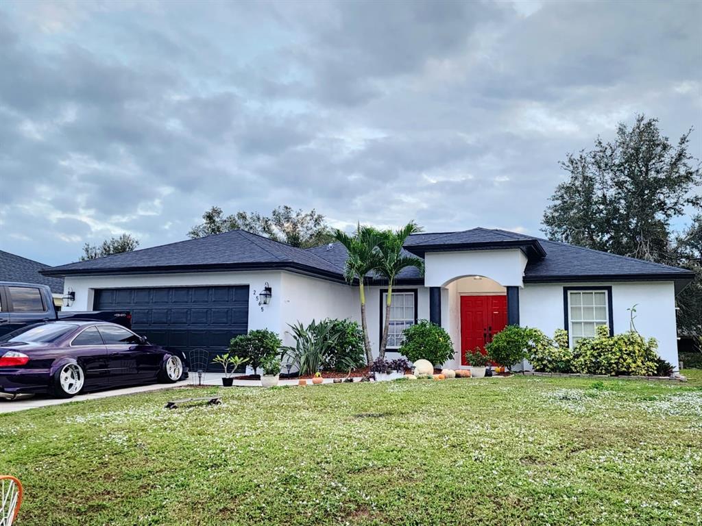 a front view of a house with garden