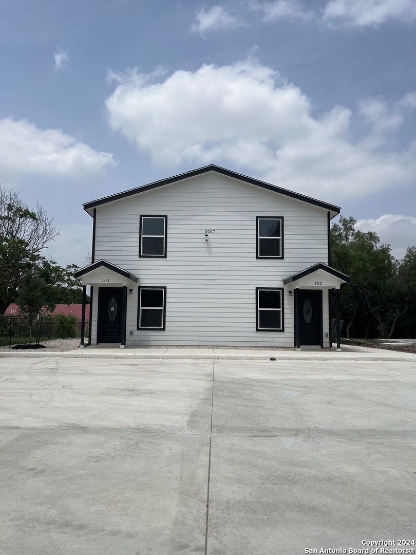 a front view of a house with windows