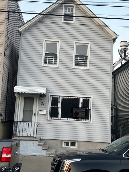 a view of a house with a garage