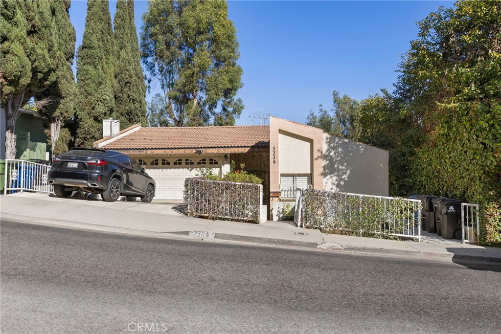 front view of a house with a street