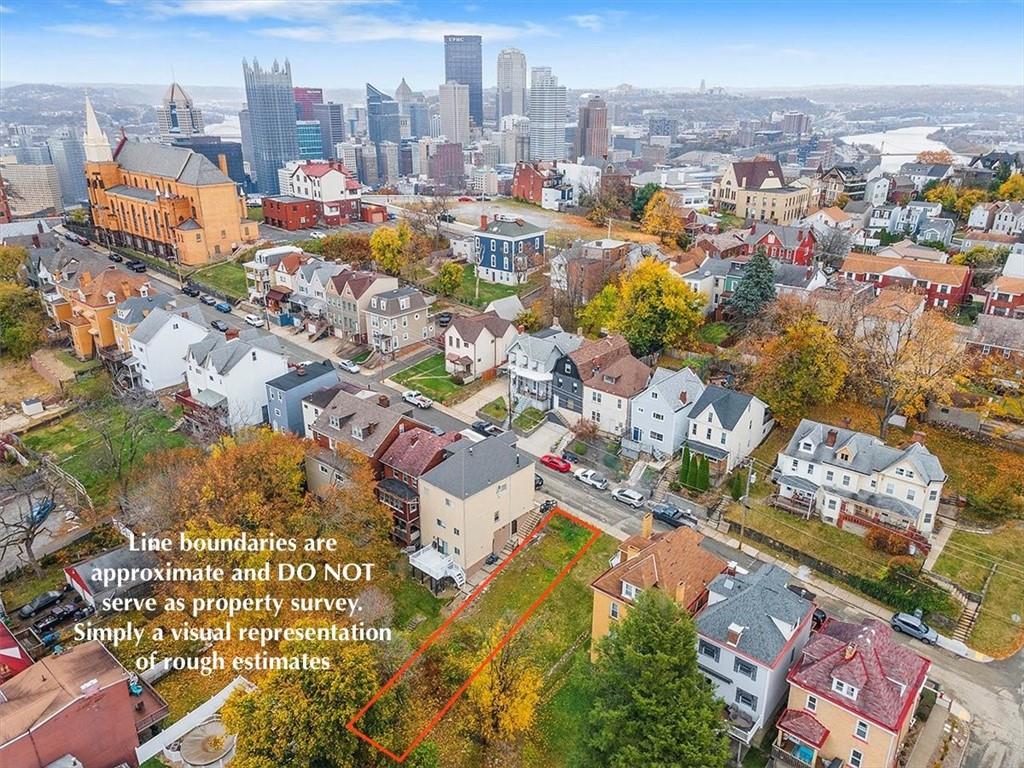 an aerial view of a city with lots of residential buildings