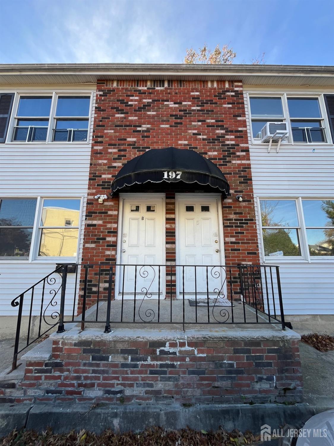 a front view of a house with entertaining space