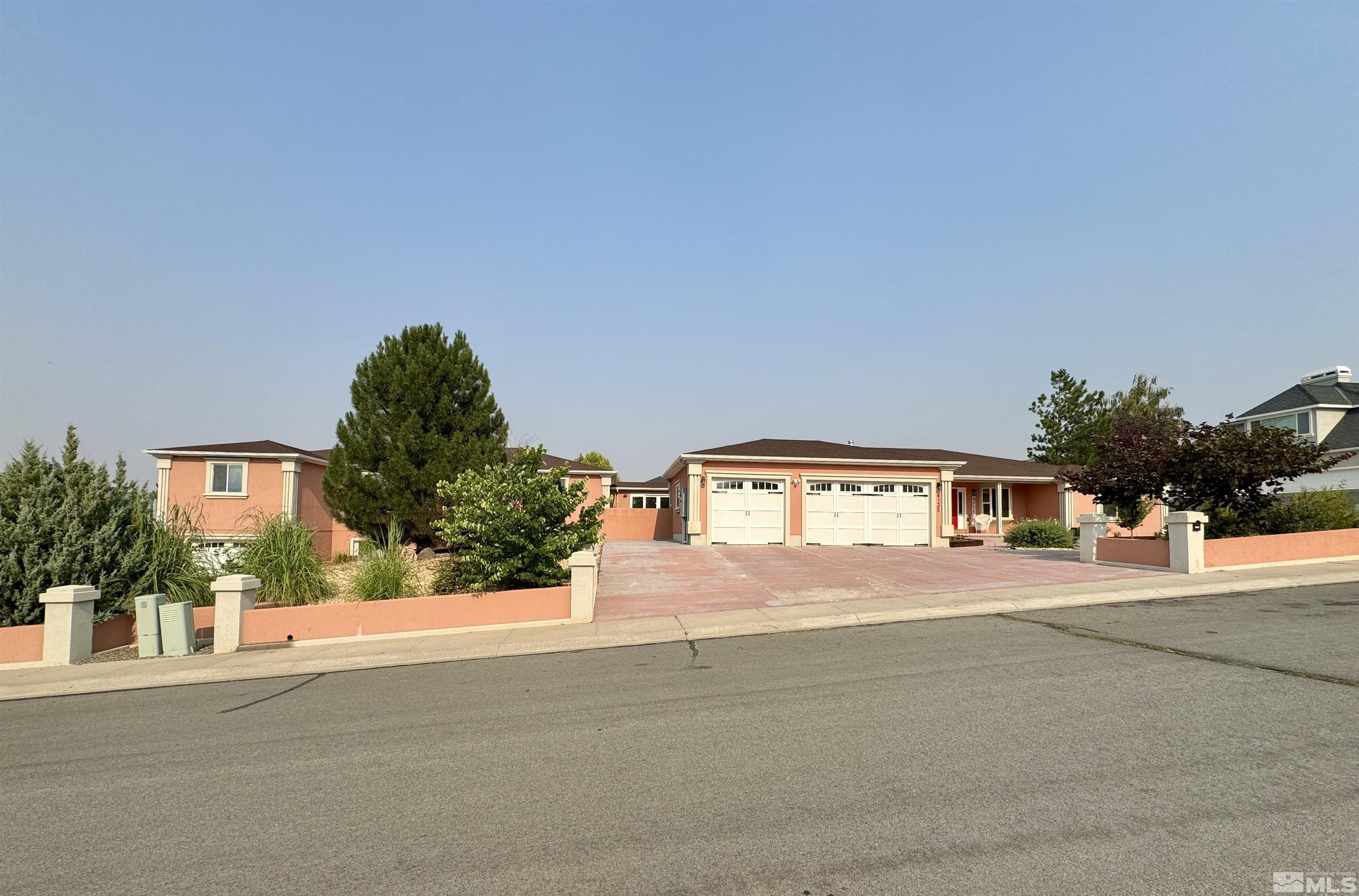 a view of a house with a street