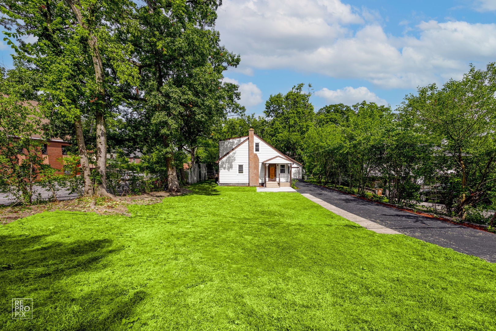 a house view with a garden space