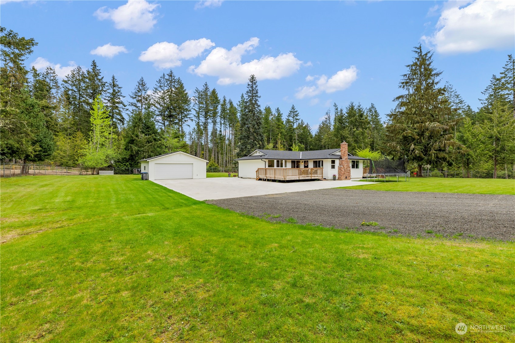 a view of a house with a big yard