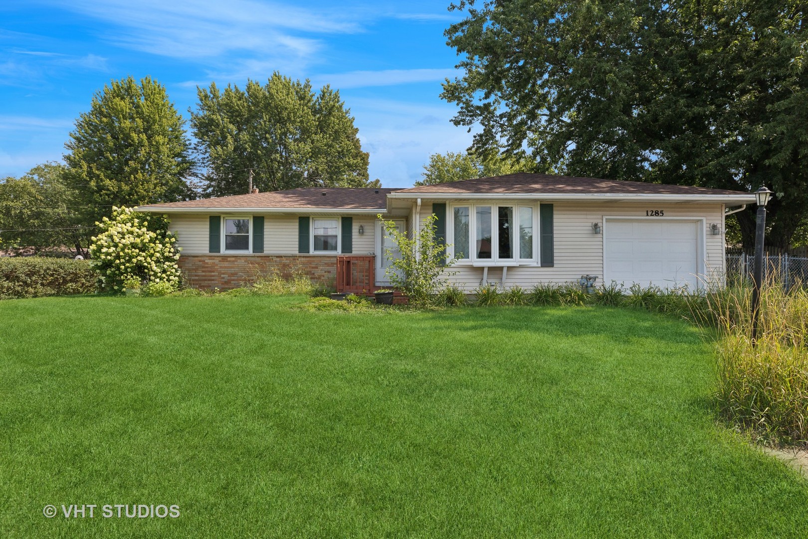 front view of house with a yard