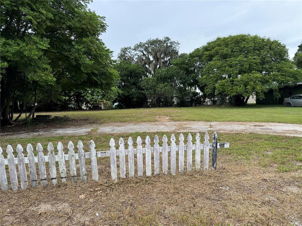 a view of a wooden fence