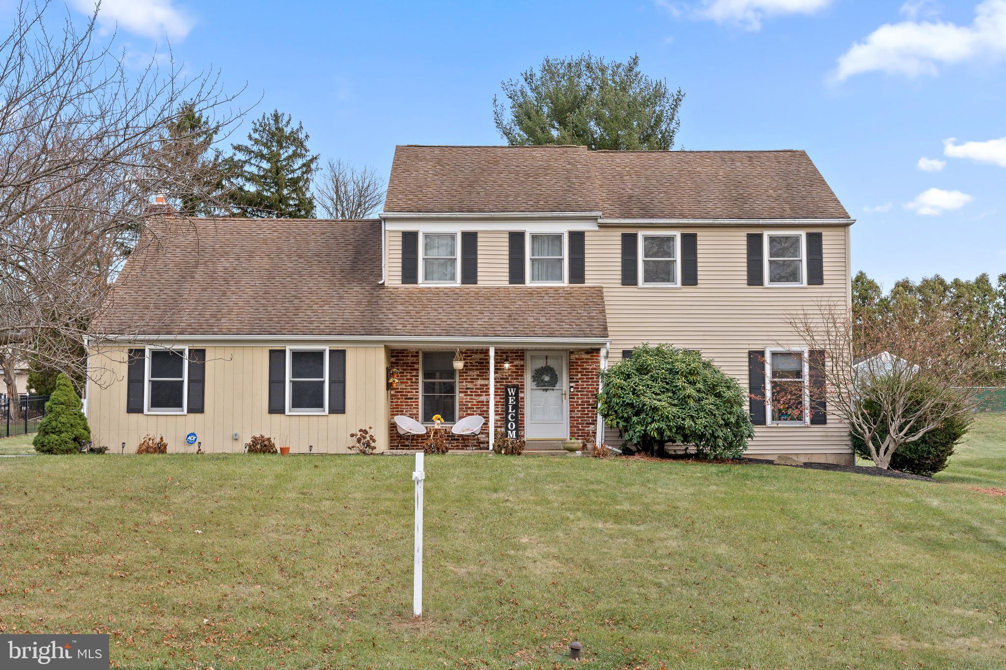 front view of house with a yard