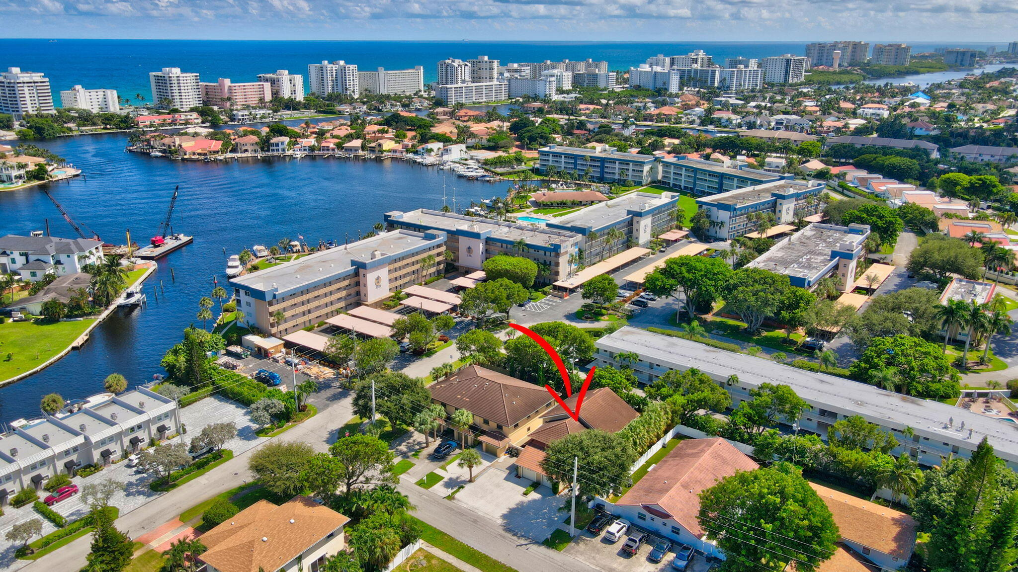 an aerial view of a houses with yard