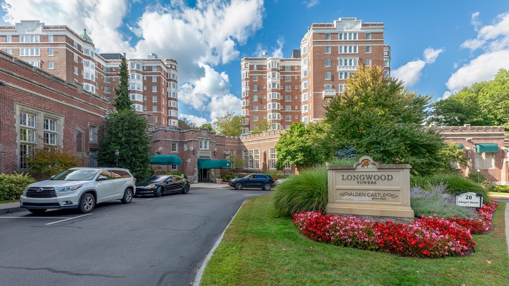 a view of a cars parked in front of a building