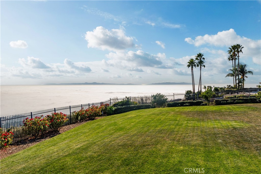 a view of a lake with a big yard