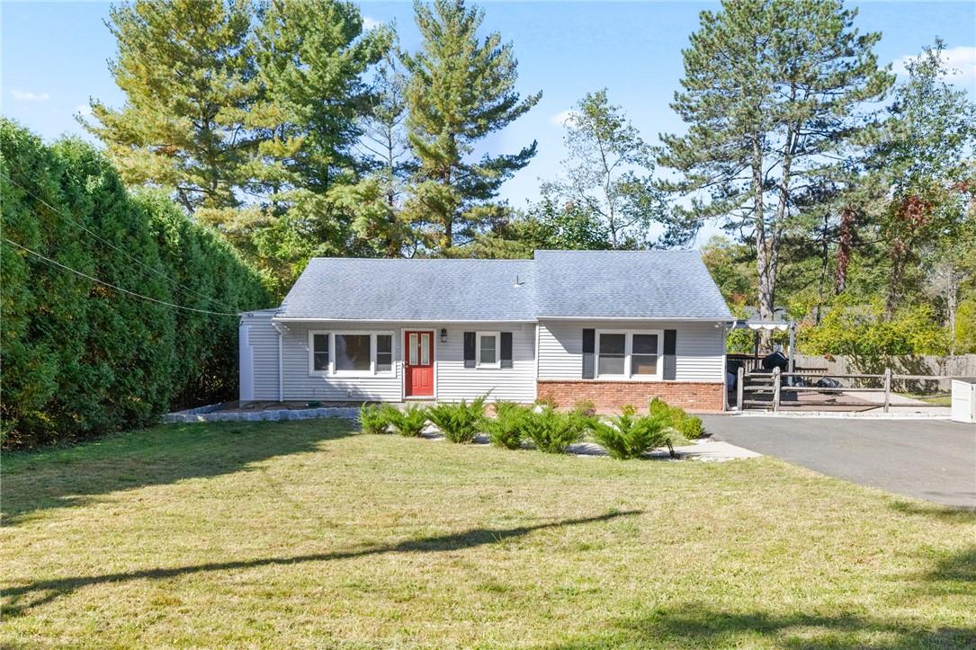 front view of a house with a yard