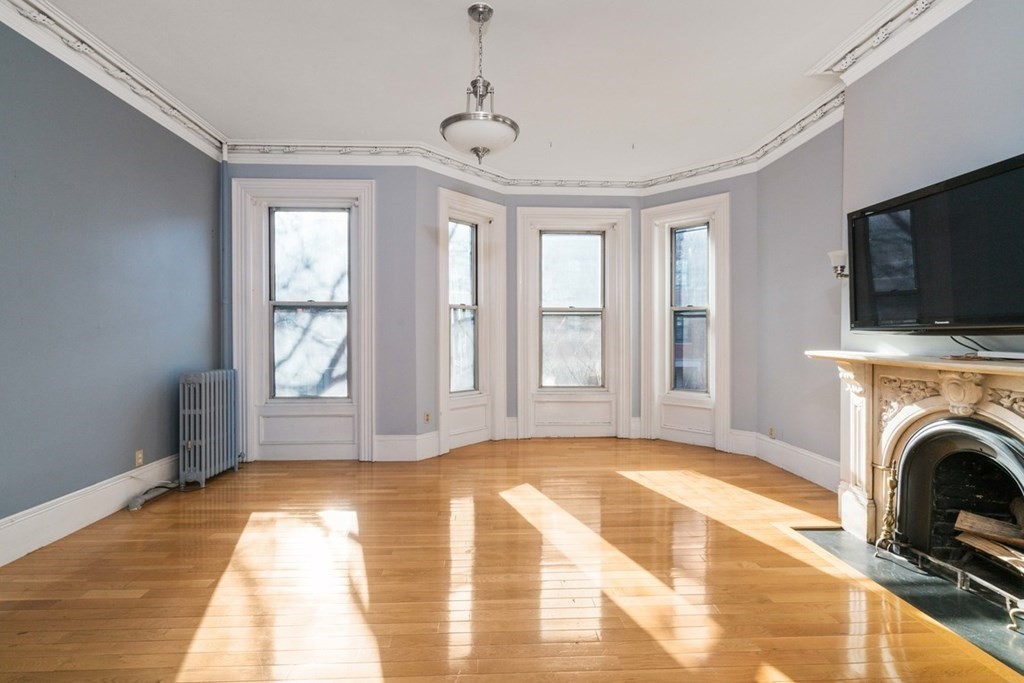 a view of livingroom with washer and dryer